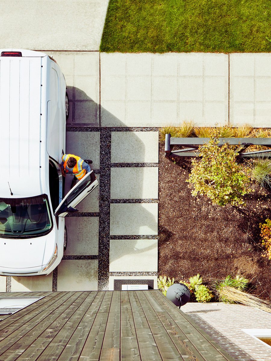 Overhead view of a fleet van parked at a facility